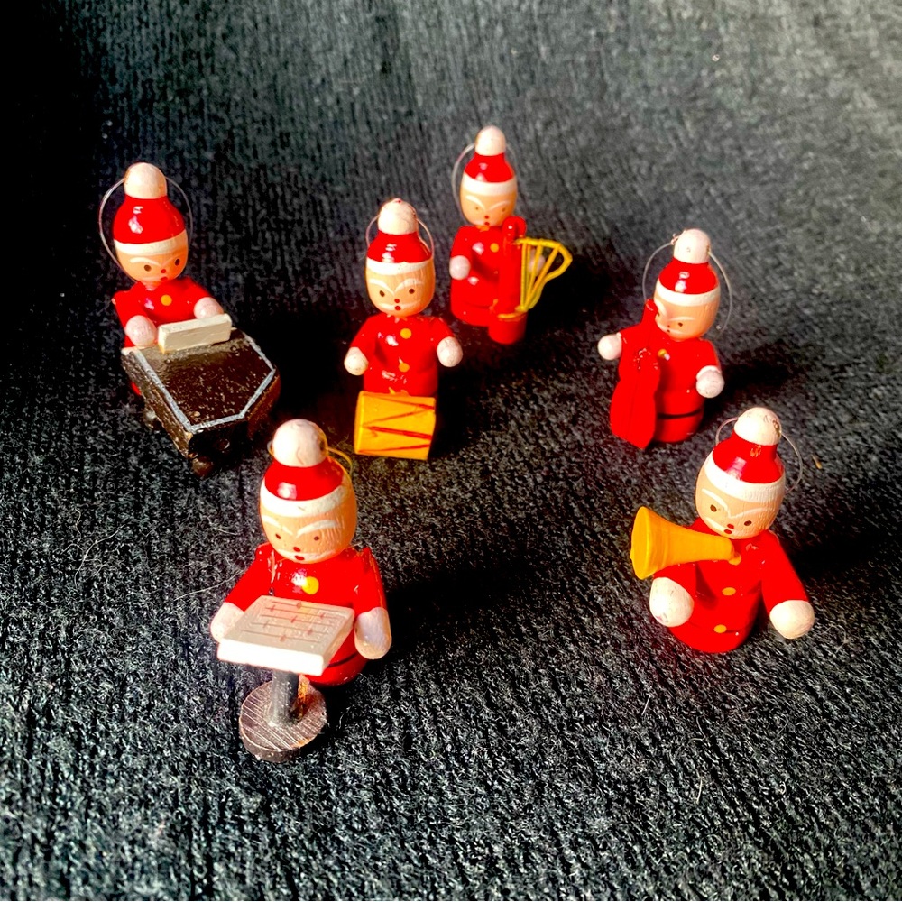 Vintage handmade wooden Santa band ornaments. Set of 6.